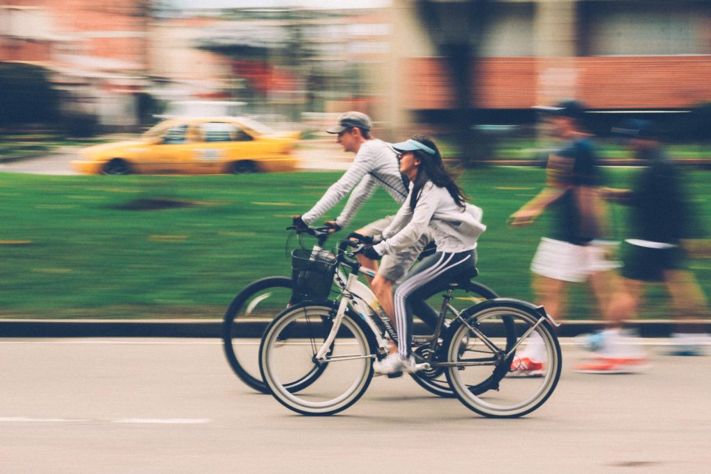 two people riding an e-bike