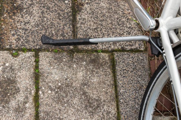 close up of an unfolded bicycle kickstand