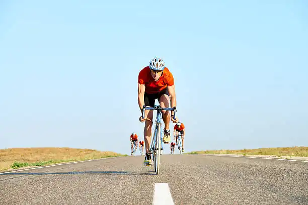 Young man taking part in cycling outdoors